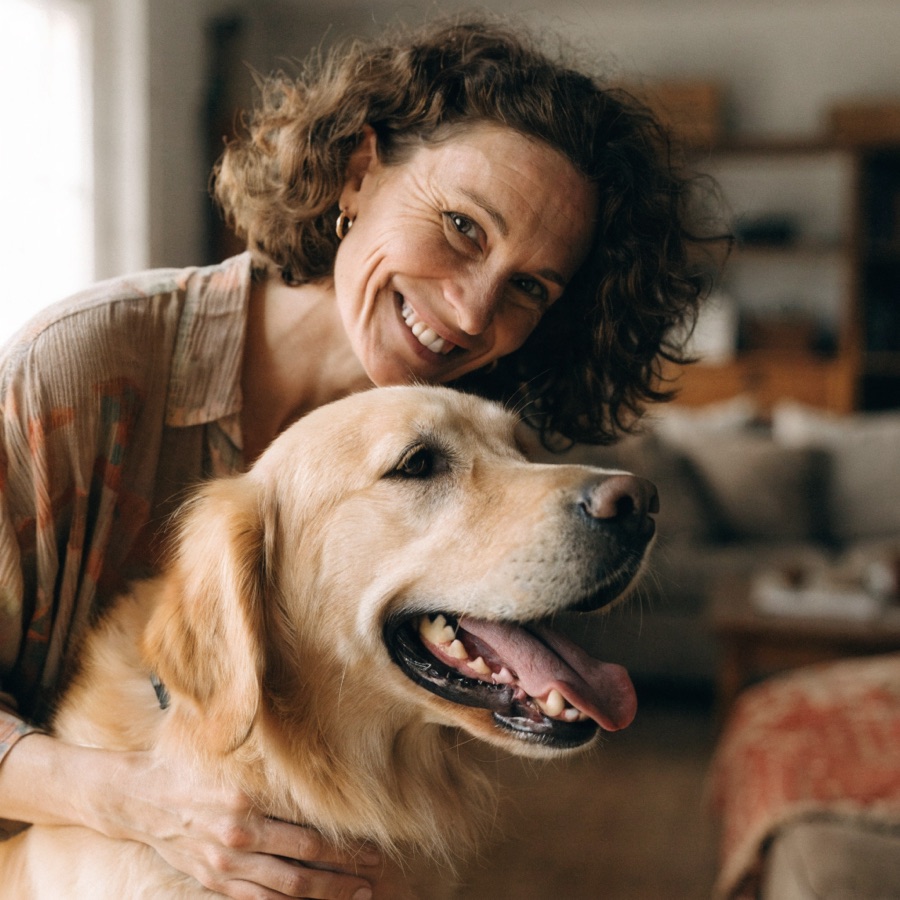 A sitter with a happy dog